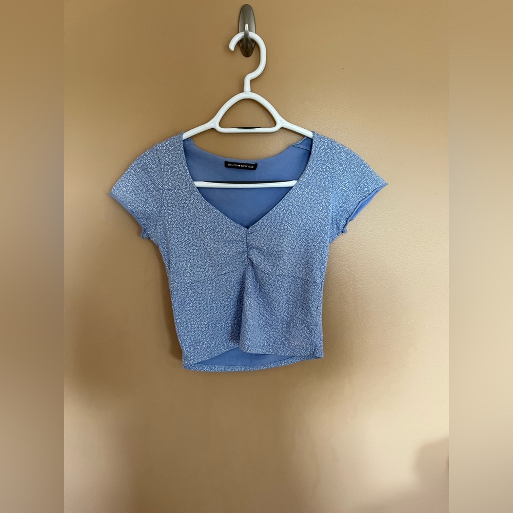Either a size xs/small light blue Brandy Melville crop.